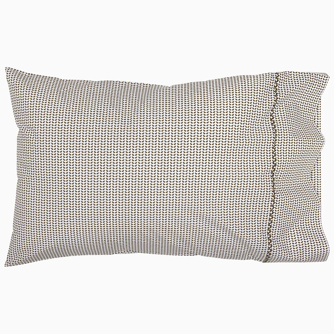 Textured gray pillow on a white background