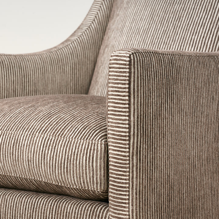 Close-up of a brown striped armchair