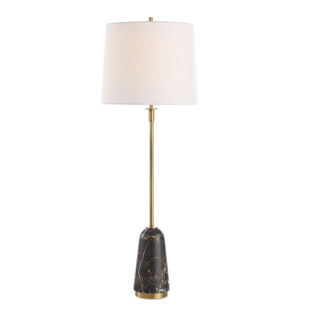 Table lamp with a marble base and brass finish on a white background