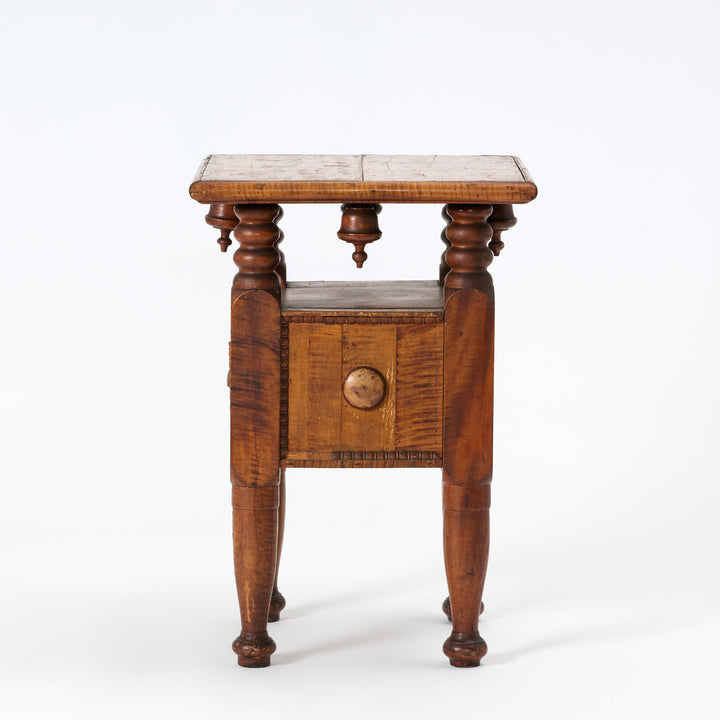 Wooden side table with wooden top on a white background