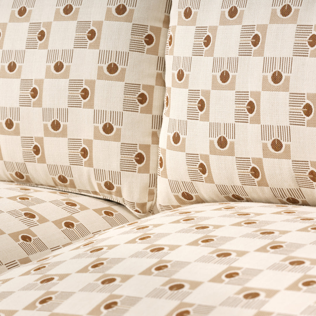 Patterned fabric with geometric design on a beige background