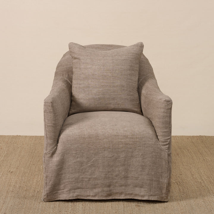 Noel Swivel Chair Slipcovered in Washable Clay Buff