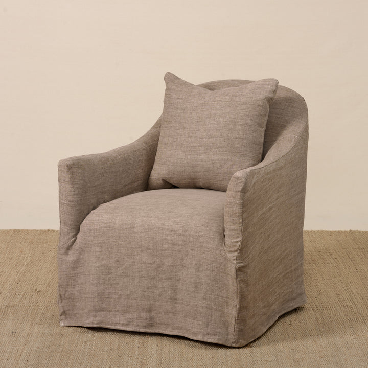 Noel Swivel Chair Slipcovered in Washable Clay Buff