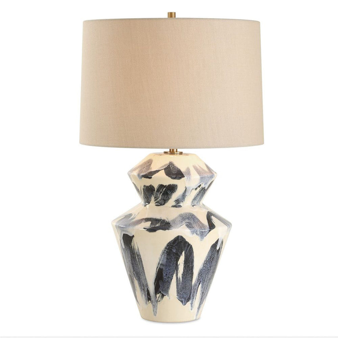 Decorative table lamp with abstract design on a white background