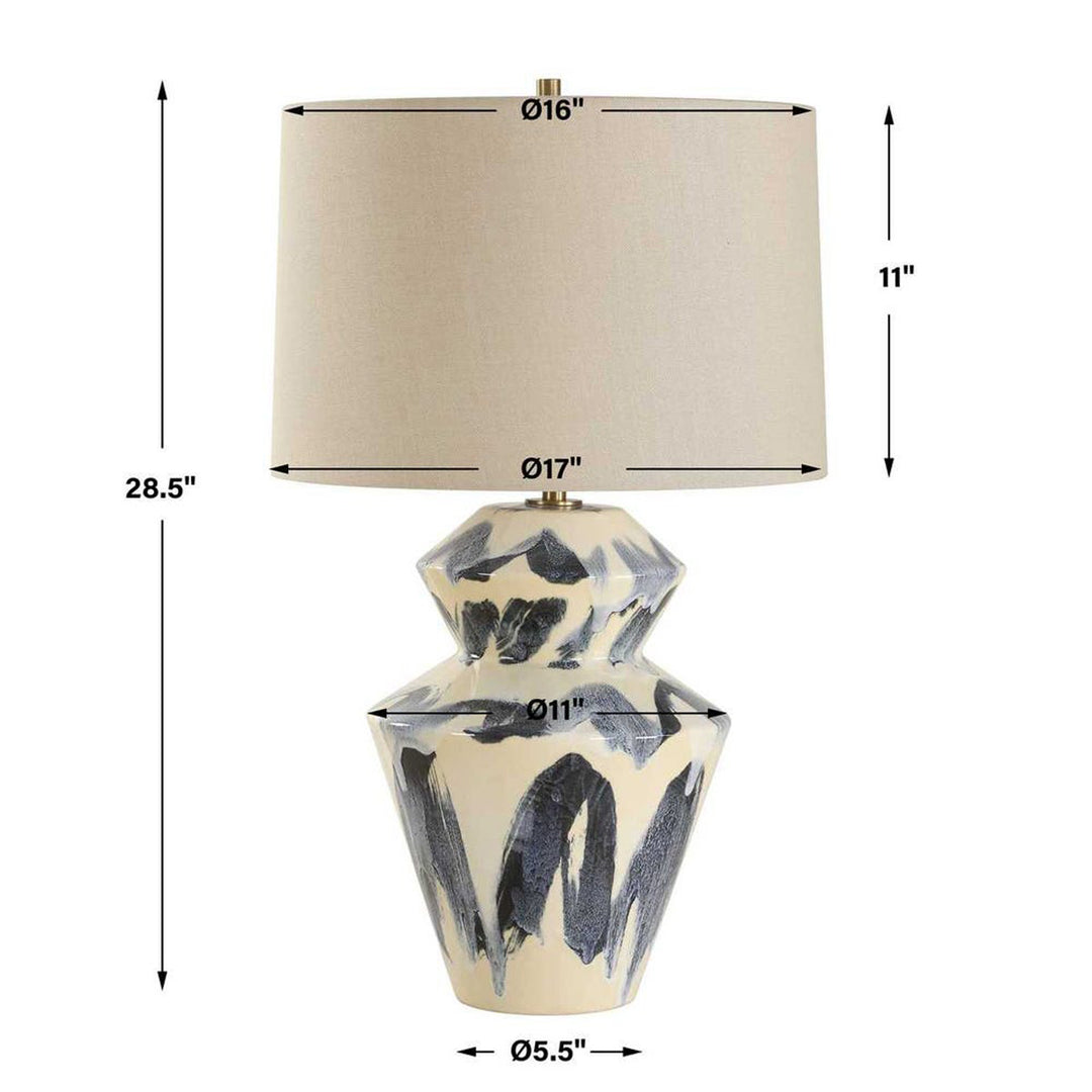 Table lamp with decorative base and beige shade, shown with measurements on a white background