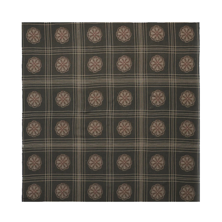 Tablecloth with a checkered pattern on a black background