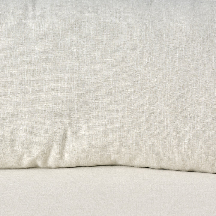 Close-up of a textured beige fabric surface