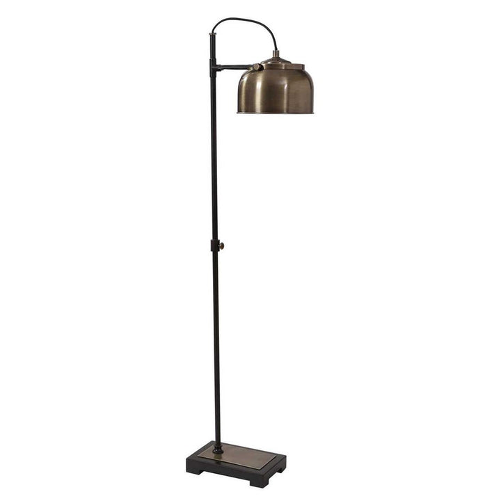 Floor lamp with a metallic shade on a white background
