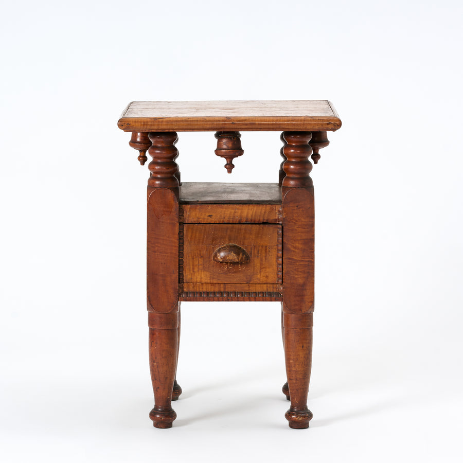 Wooden side table with wooden top on a white background