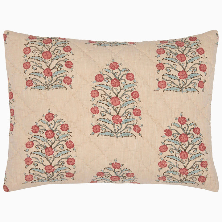 Decorative pillow with floral patterns on a beige background
