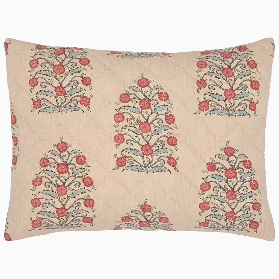 Decorative pillow with floral patterns on a beige background