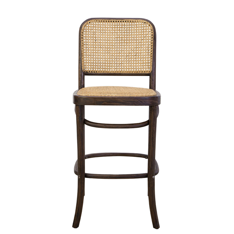A brown bar stool with a hard backrest and a woven seat, made of beech and cane.