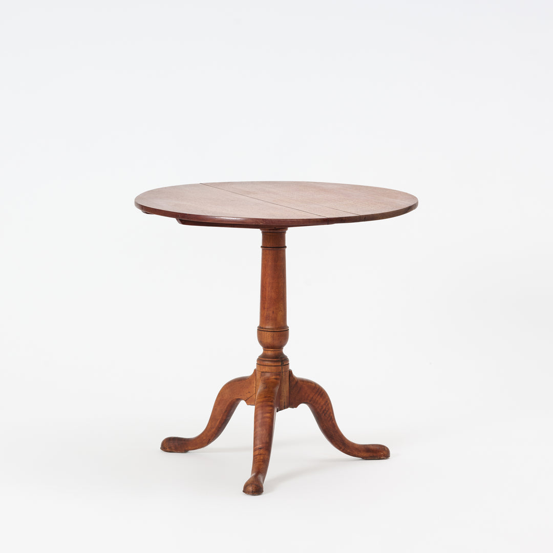 Wooden round table with a white background