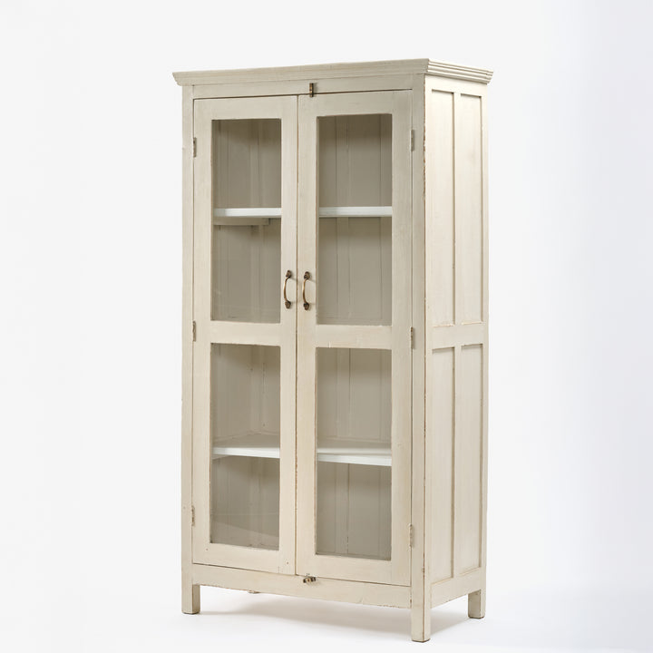 White wooden cabinet with glass doors on a white background