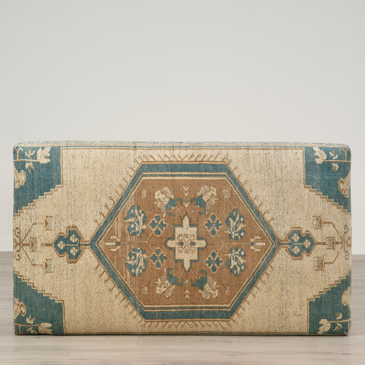 Decorative rectangular pillow with geometric pattern on a plain background