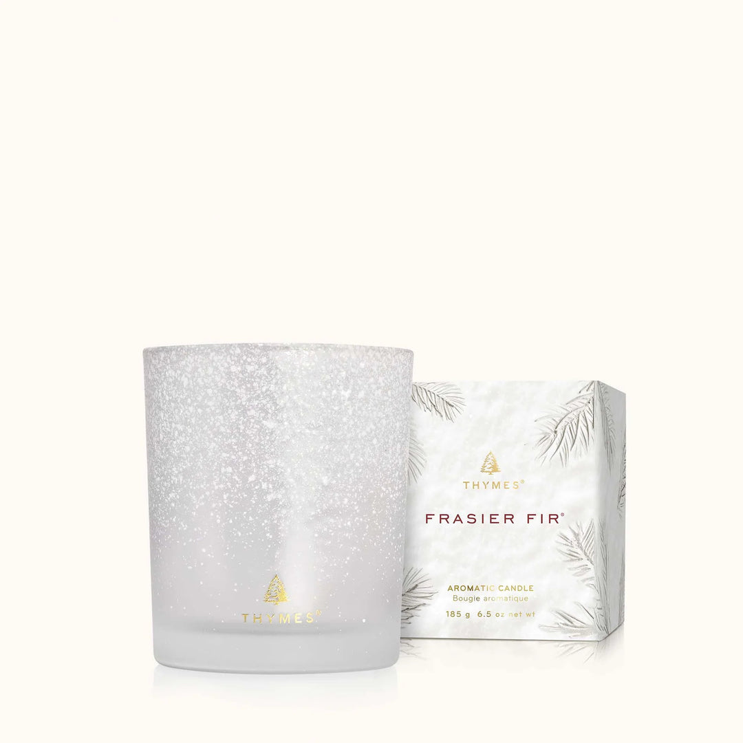 Thymes Frasier Fir candle and packaging on a white background