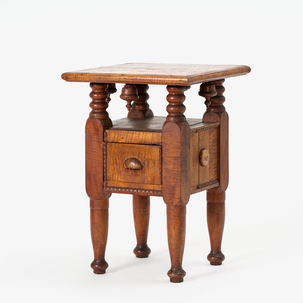 Wooden side table with wooden top on a white background
