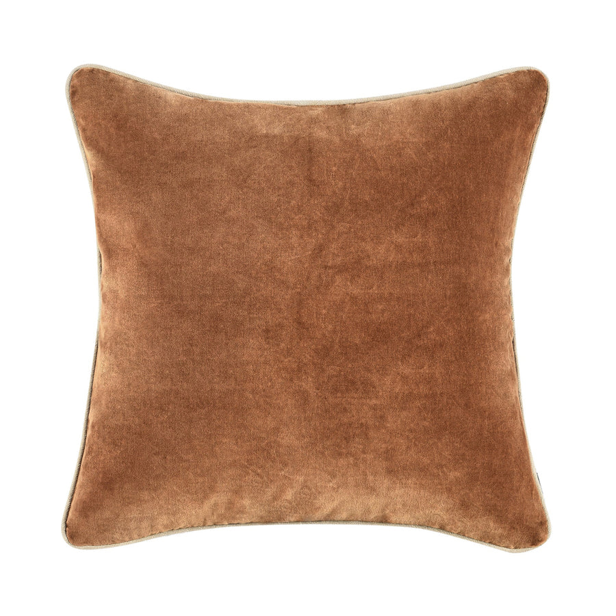 Brown velvet pillow on a white background