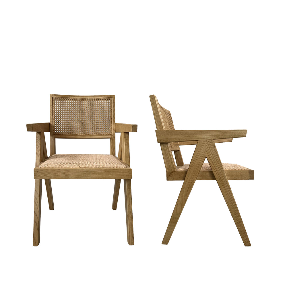 Two wooden chairs with woven backrests on a white background