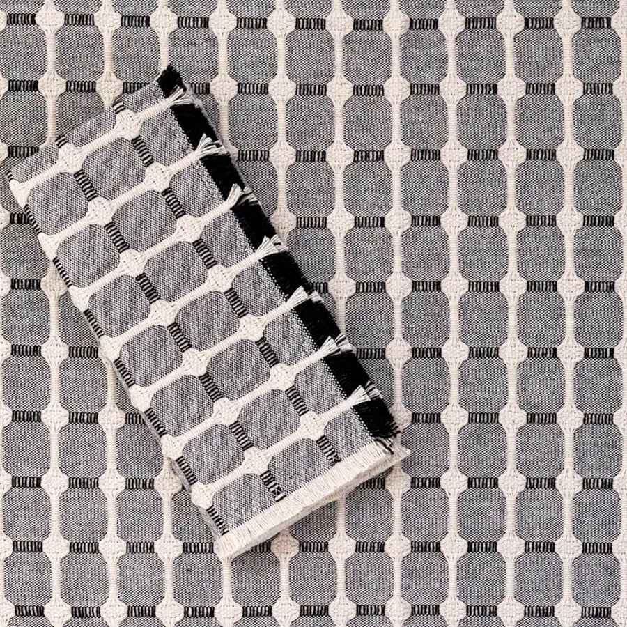 Textile with geometric pattern on a textured surface
