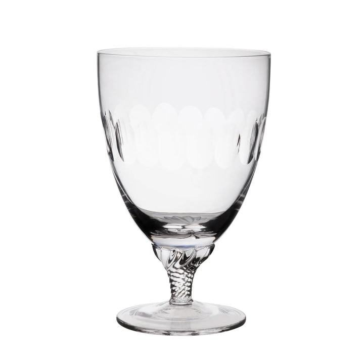 Clear glass goblet on a white background