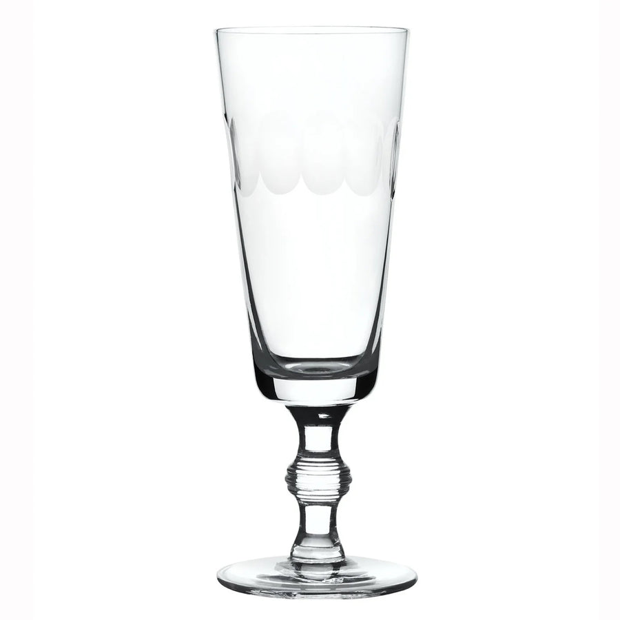 Clear glass with a decorative base on a white background