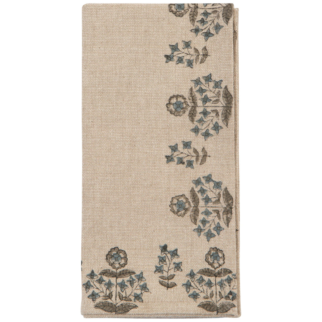 Textile with floral embroidery on a beige background