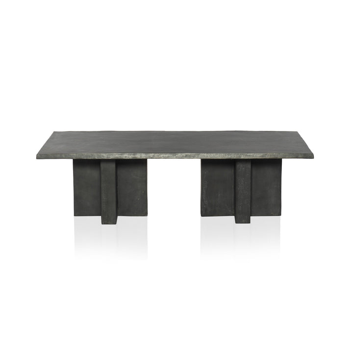 Modern dining table with dark marble top and wooden legs on a white background