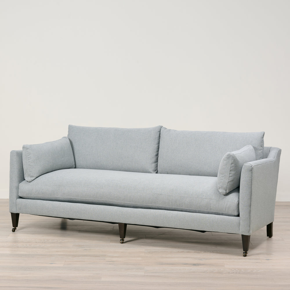 Holloway 90" Sofa  Upholstered in Kidproof Ice Blue with Tapered Leg in Chocolate Finish and Brass Caster with Cloud Down Standard Cushion