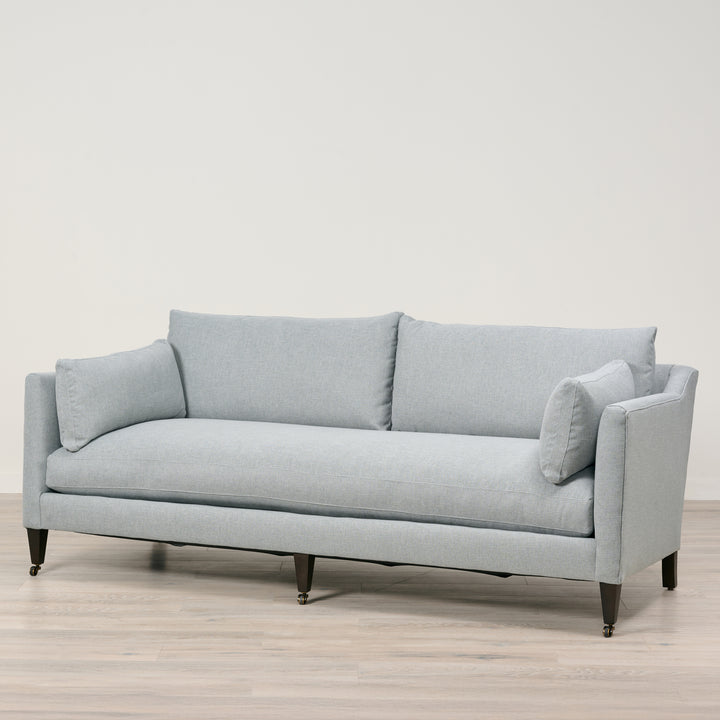 Holloway 90" Sofa  Upholstered in Kidproof Ice Blue with Tapered Leg in Chocolate Finish and Brass Caster with Cloud Down Standard Cushion