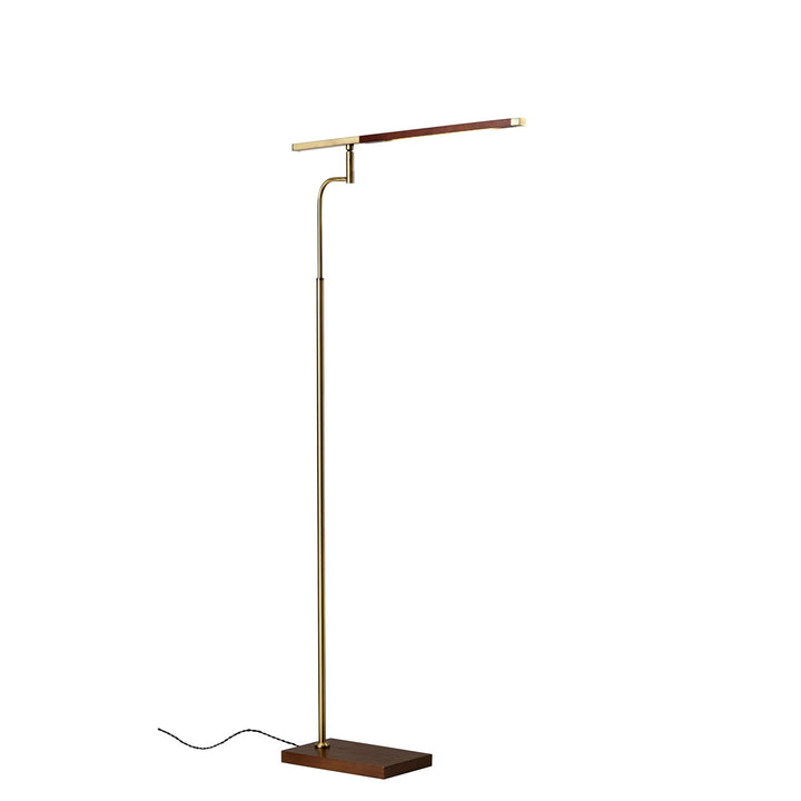 Modern floor lamp with adjustable arm on a white background