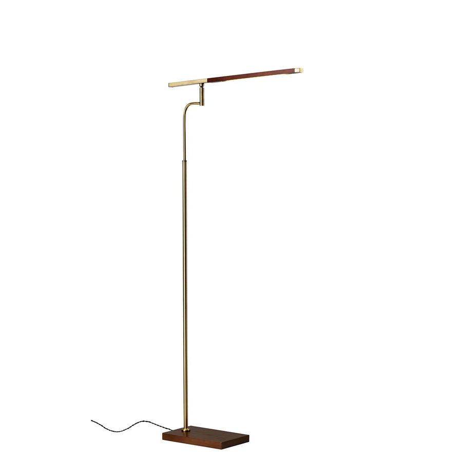 Modern floor lamp with adjustable arm on a white background