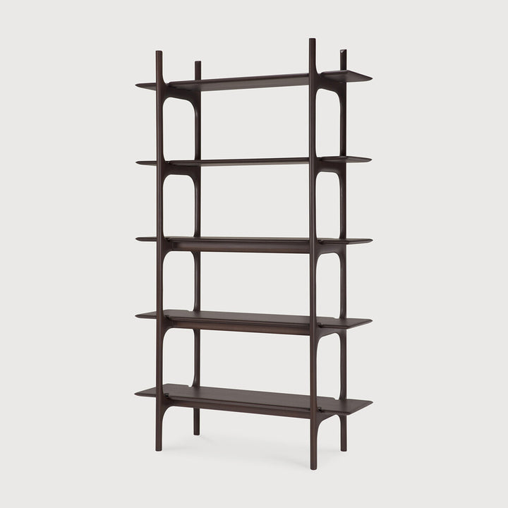 Dark wood bookshelf with multiple shelves on a light gray background