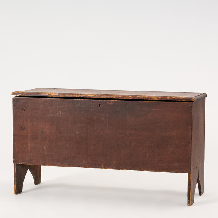 Vintage wooden chest on a white background