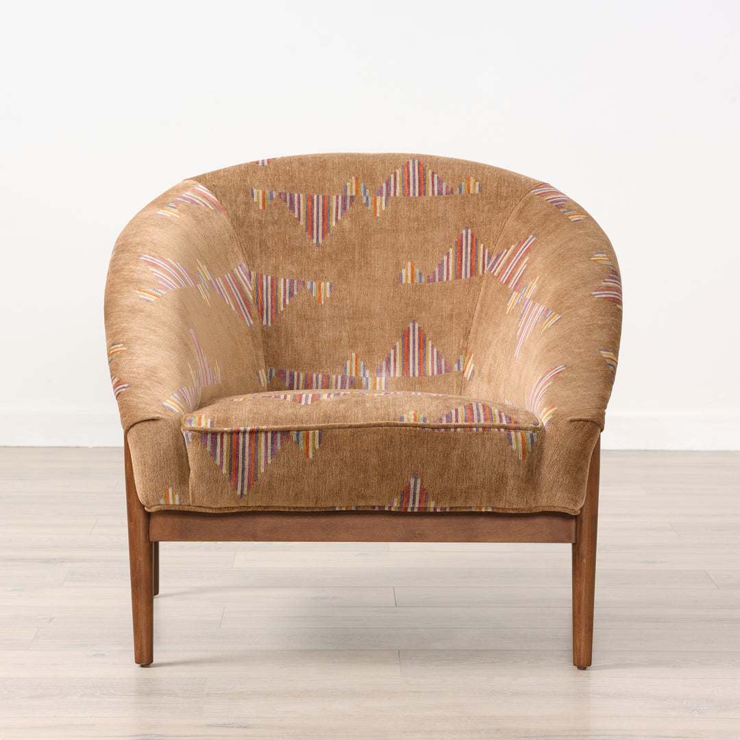 Brown armchair with multicolored pattern on a white background