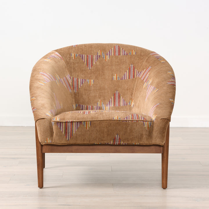 Brown armchair with multicolored pattern on a white background