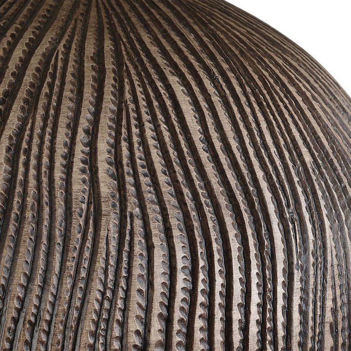 Close-up of a textured sphere with concentric circular patterns
