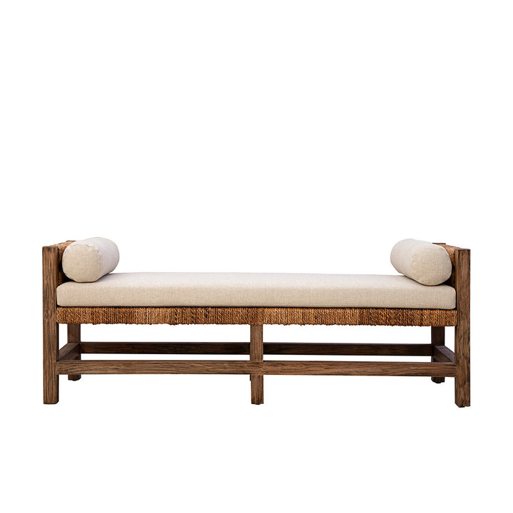 Wooden bench with beige cushion and spherical cushions on a white background