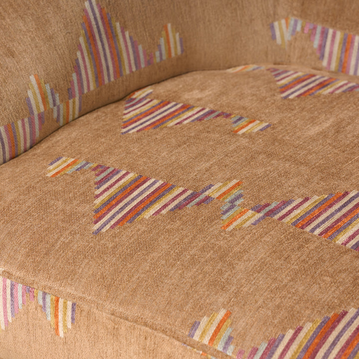 Close-up of a textured fabric with multicolored striped patterns on a brown background