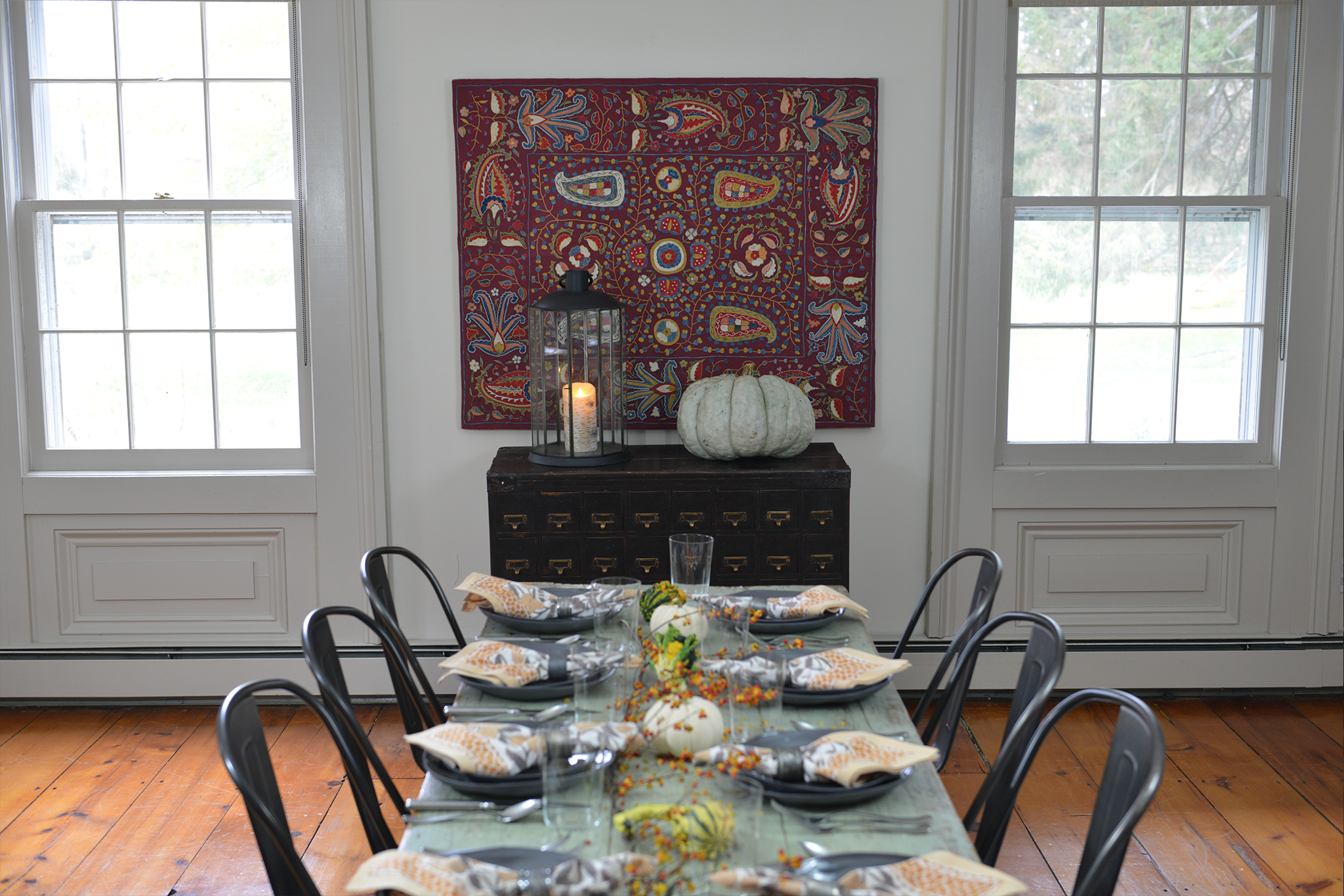 Thanksgiving table set in old home with hardwood floors